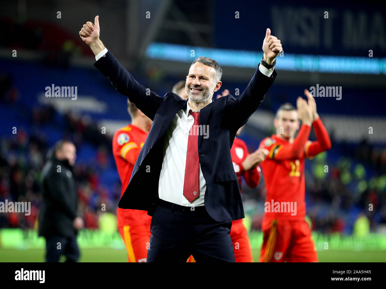 Wales' manager Ryan Giggs celebrates victory and qualification after the UEFA Euro 2020 Qualifying match at the Cardiff City Stadium. Stock Photo