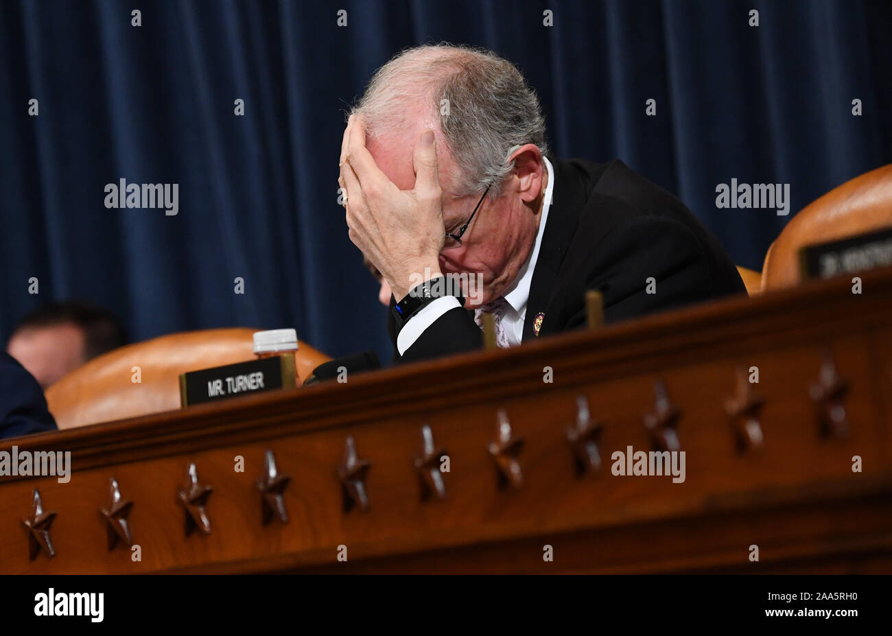 Washington, United States. 19th Nov, 2019. Rep. Mike Conaway, R-Tex., listens as former State Department special envoy to Ukraine Kurt Volker testifies before the House Permanent Select Committee on Intelligence as part of the impeachment inquiry into President Donald Trump, on Capitol Hill in Washington, DC, on Tuesday, November 19, 2019. The hearings are looking into whether Trump used military aid as leverage to pressure Ukraine into investigations that would benefit him politically. Photo by Kevin Dietsch/UPI Credit: UPI/Alamy Live News Stock Photo