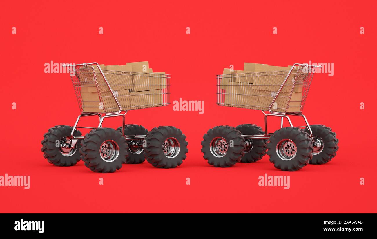 Two shopping trolleys with offroad wheels and cardboard boxes Stock