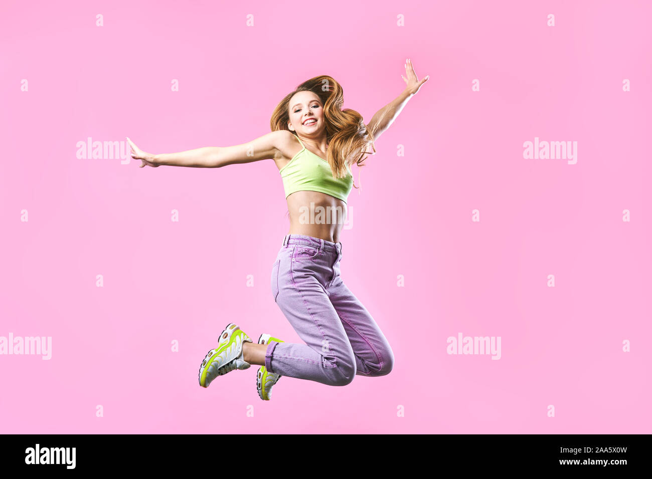 Girlish, funky, happiness, dream, fun, joy, summer concept. Very excited happy cute girl is