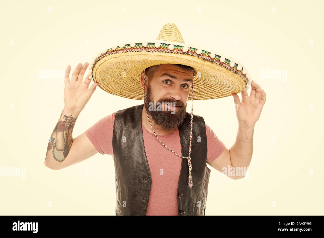 Mexican melody drives him. Celebrate traditional mexican holiday. Mexican  party concept. Guy happy cheerful festive outfit ready to celebrate. Man  bearded cheerful guy wear sombrero mexican hat Stock Photo - Alamy