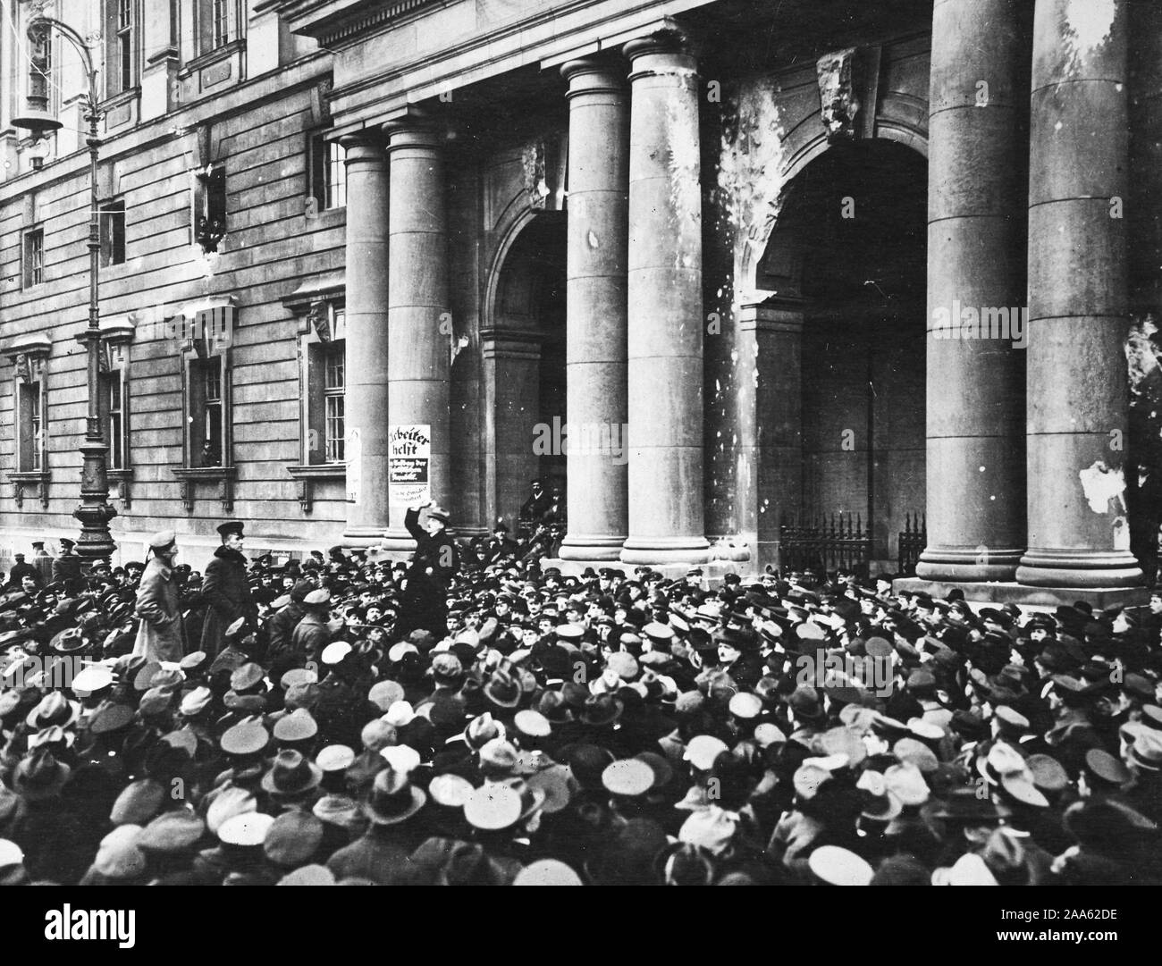 Revolution in Berlin. Revolutionary crowd, composed of Spartacans, holding demonstration in front of Imperial Stables in Berlin, Germany ca. 1919 Stock Photo