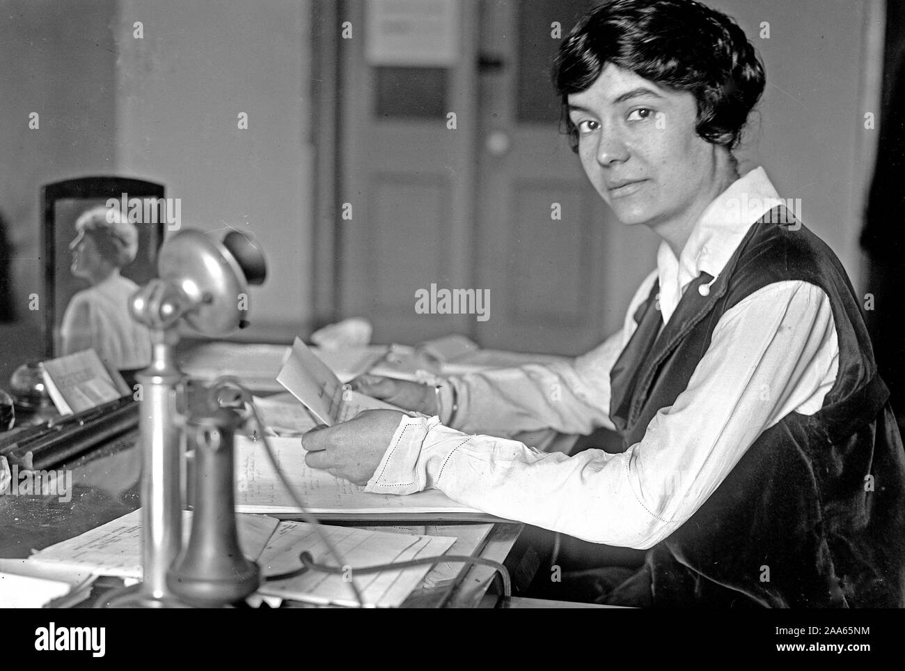 Woman working in an office in the early 1900s - ca. 1913-1918 Stock Photo