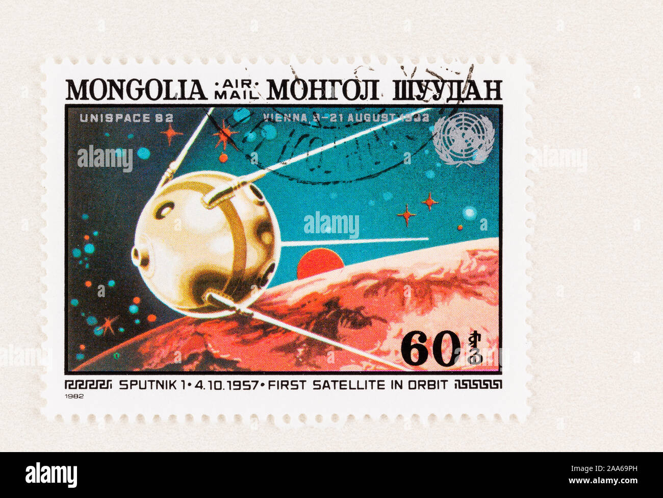 SEATTLE WASHINGTON - October 5, 2019: First satellite, Soviet Sputnik 1, orbiting earth on 1982 Mongol postage stamp. Stock Photo
