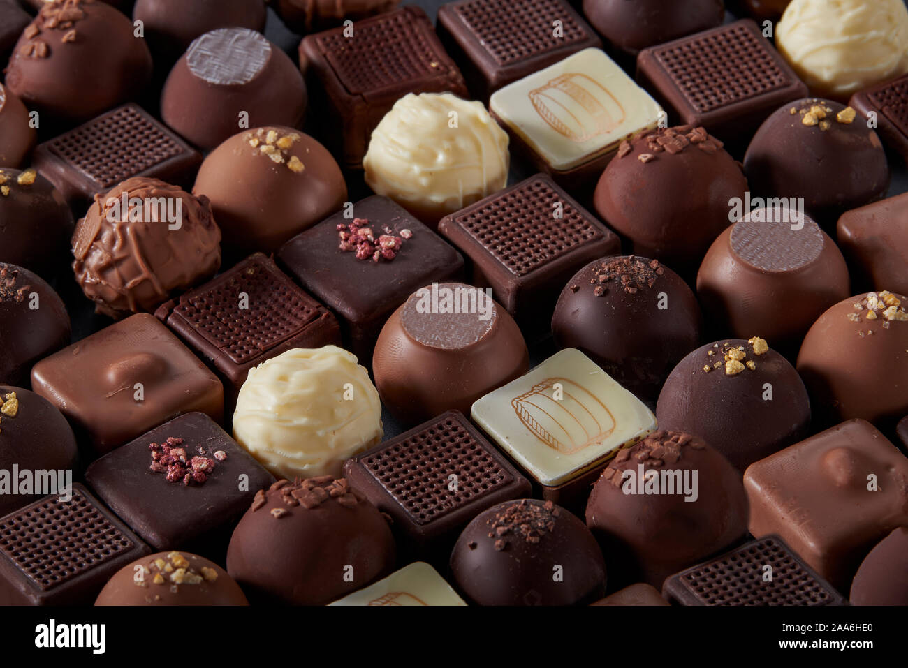 A pile of exquisite and beautiful chocolate cubes full of pictures Stock  Photo - Alamy