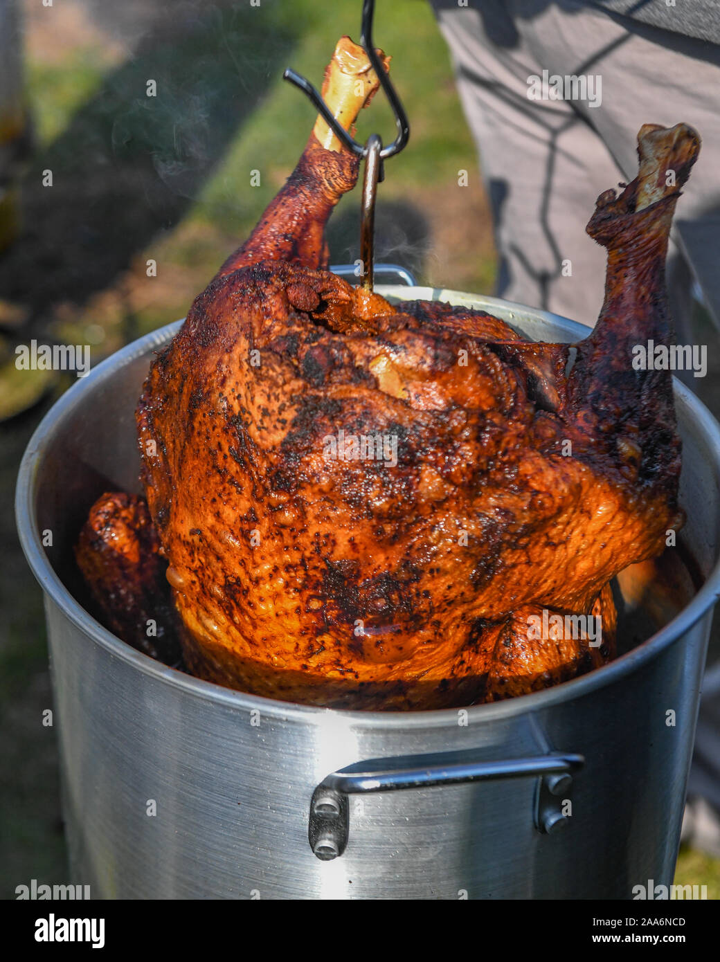 Deep fried turkey for Thanksgiving holiday - hot turkey Stock Photo
