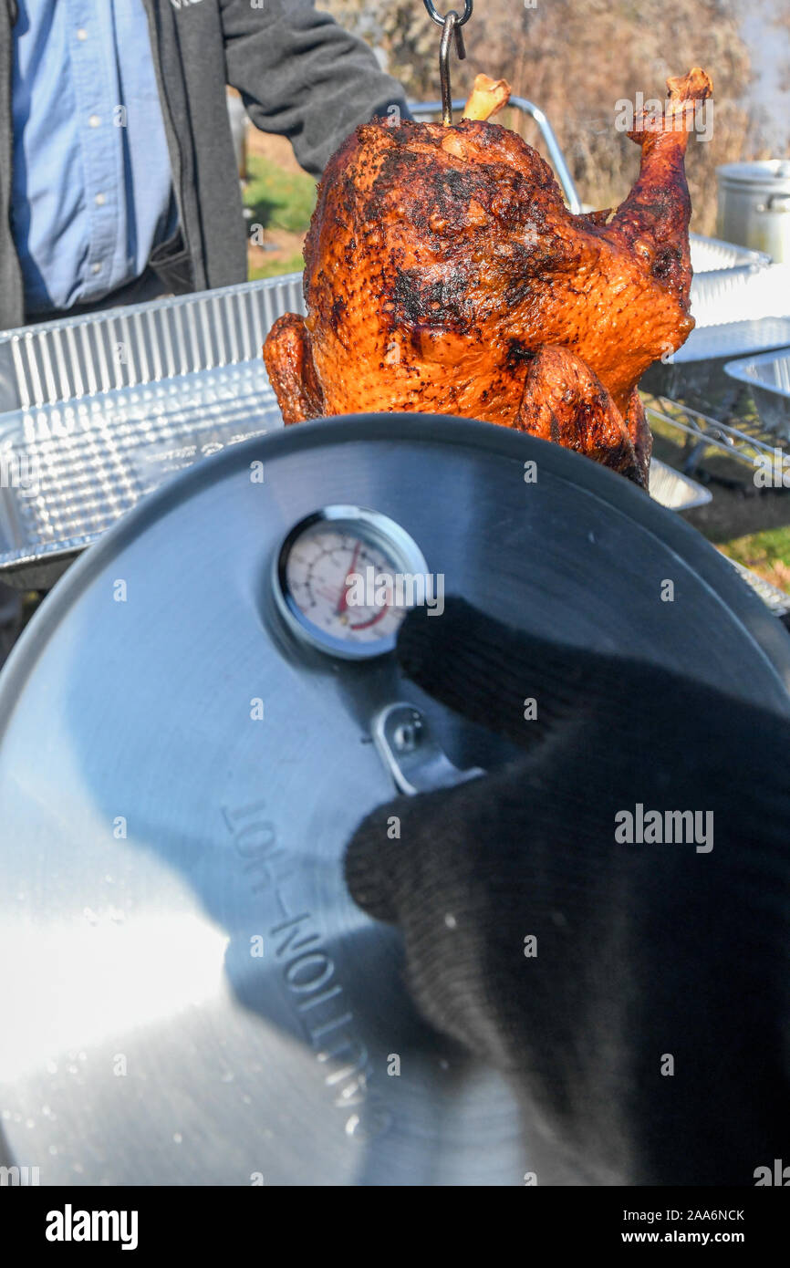 Deep fried turkey for Thanksgiving holiday - hot turkey Stock Photo