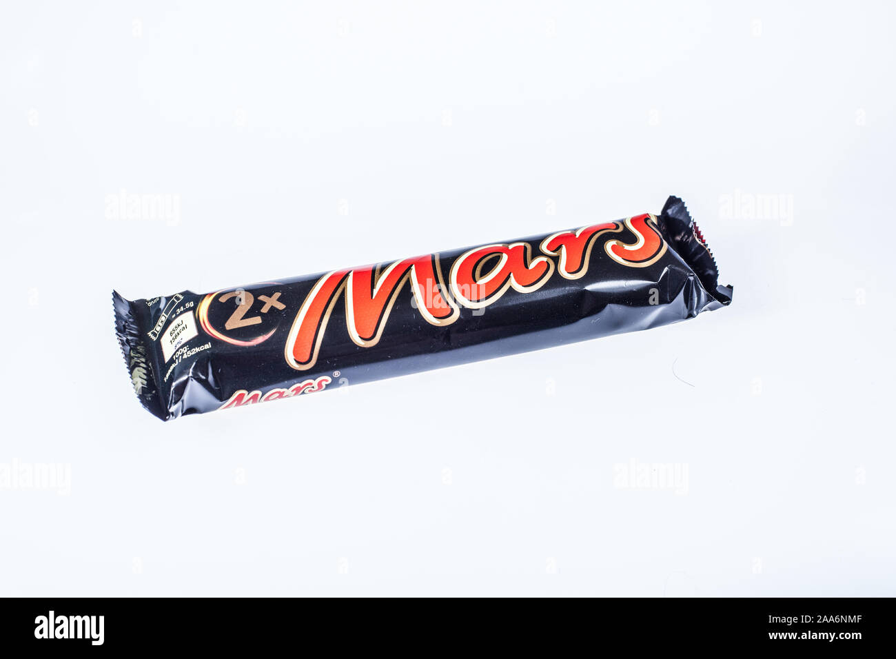 Closeup of Mars candy chocolate bar, winter, snow Stock Photo