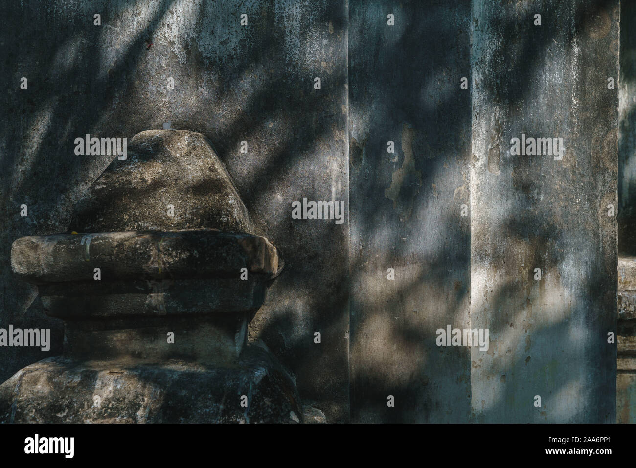 Ancient concrete wall with sunlight shadow Stock Photo