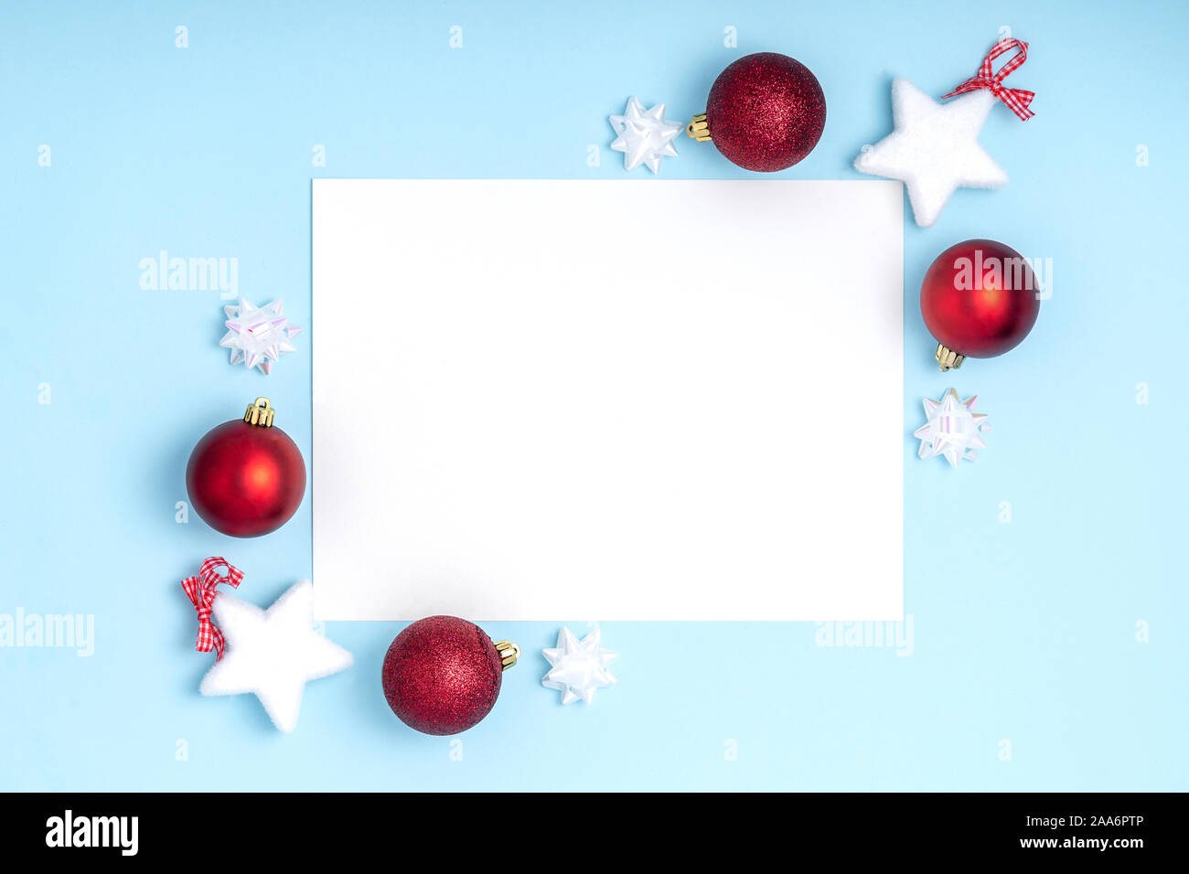 New Year and Christmas frame composition. Blank sheet of paper on pastel  blue background. Top view, flat lay, copy space. Template design invitation  card Stock Photo - Alamy