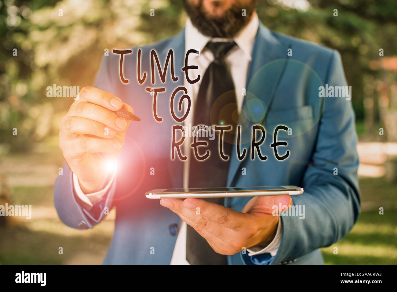 Writing note showing Time To Retire. Business concept for Take the  pensioner status stop working in elderly old enough Businessman in blue  suite stand Stock Photo - Alamy