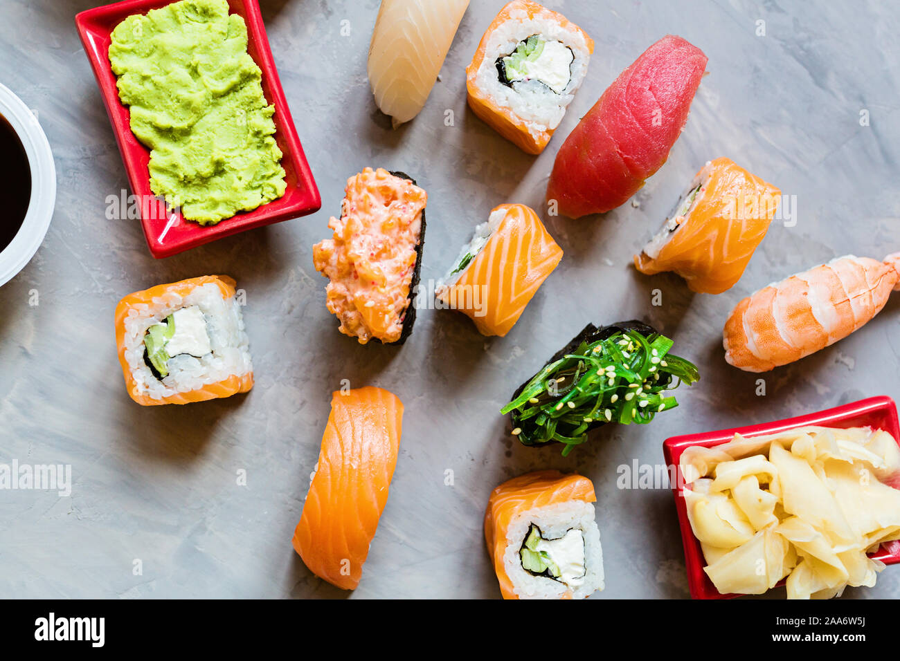 Top view on traditional japanese empty with sushi, ginger, soy sauce, wasab...