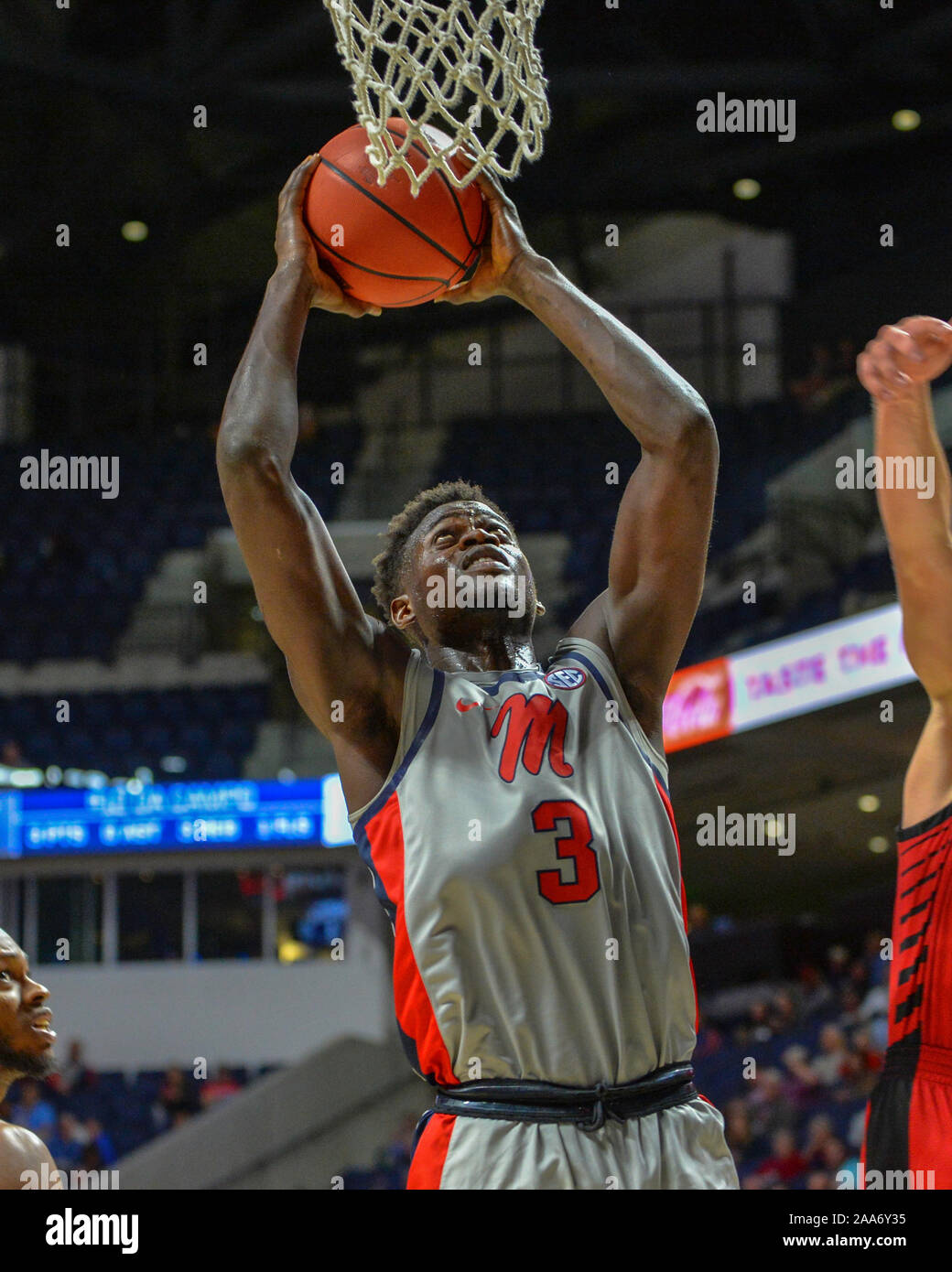 Oxford, MS, USA. 19th Nov, 2019. Ole' Miss forward, Khadim Sy (3), goes to  the basket for the slam during the NCAA basketball game between the Seattle  Redhawks and the Ole' Miss