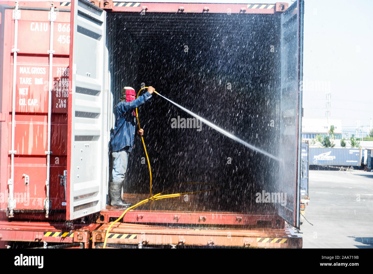 Cleaning inside containers Industry for export and import Stock Photo