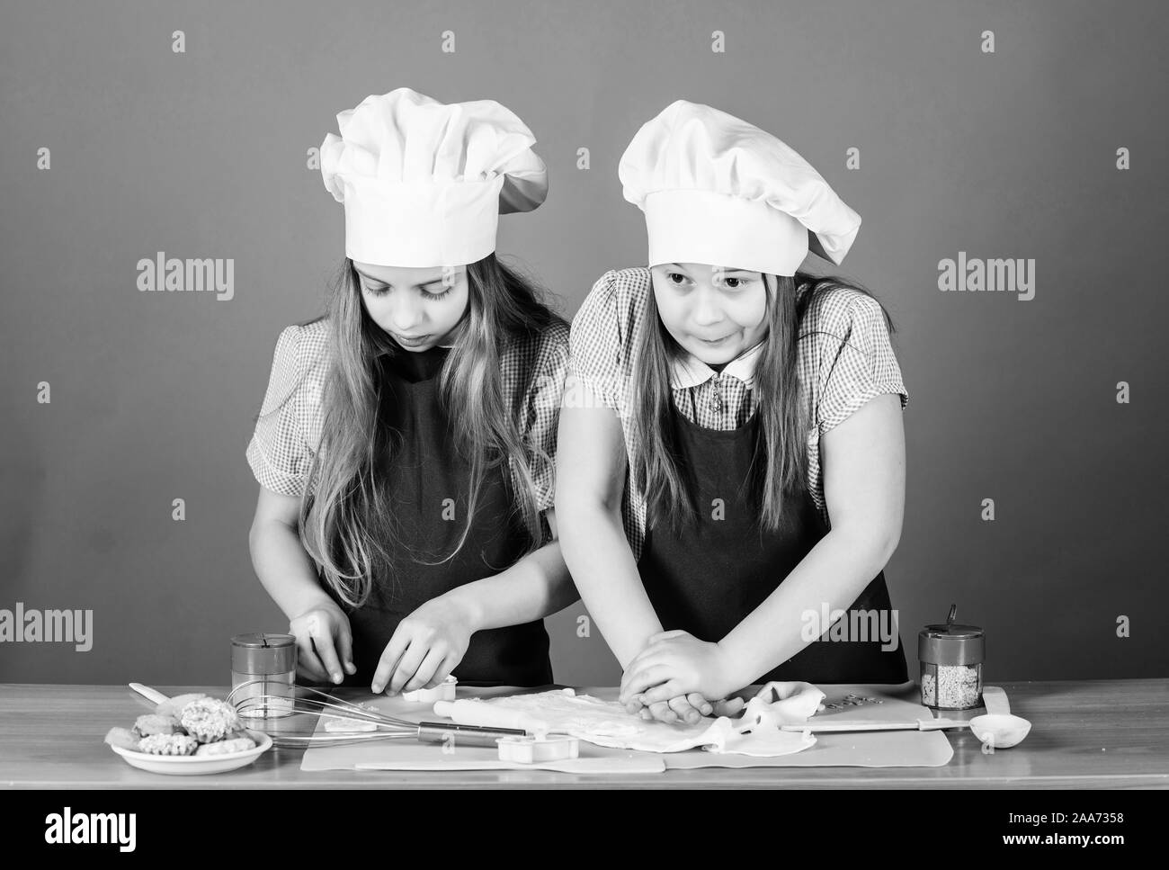 Home cooking to your soul. Little girls preparing home cooked food