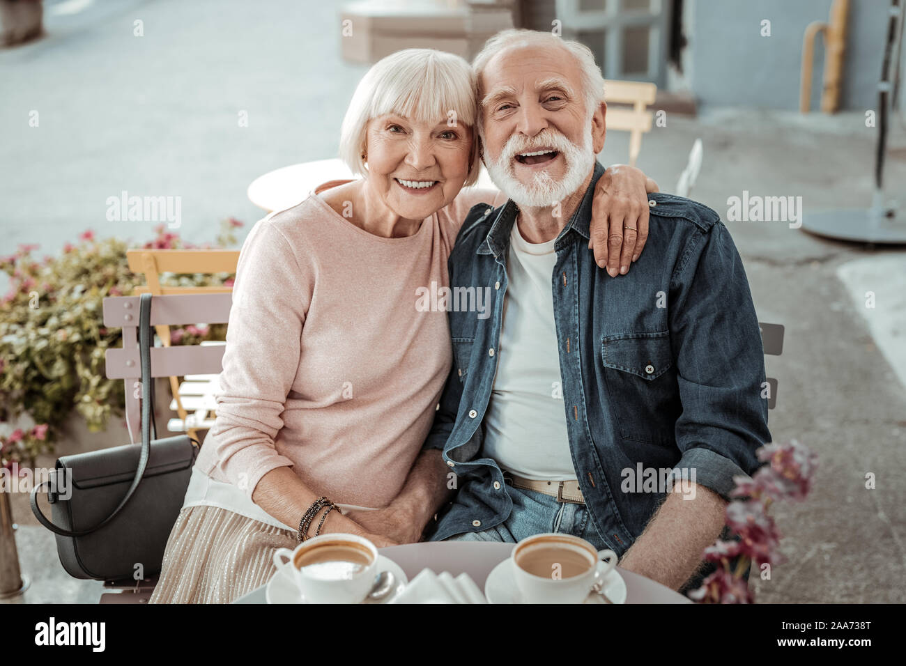 Delighted nice couple enjoying their time together Stock Photo