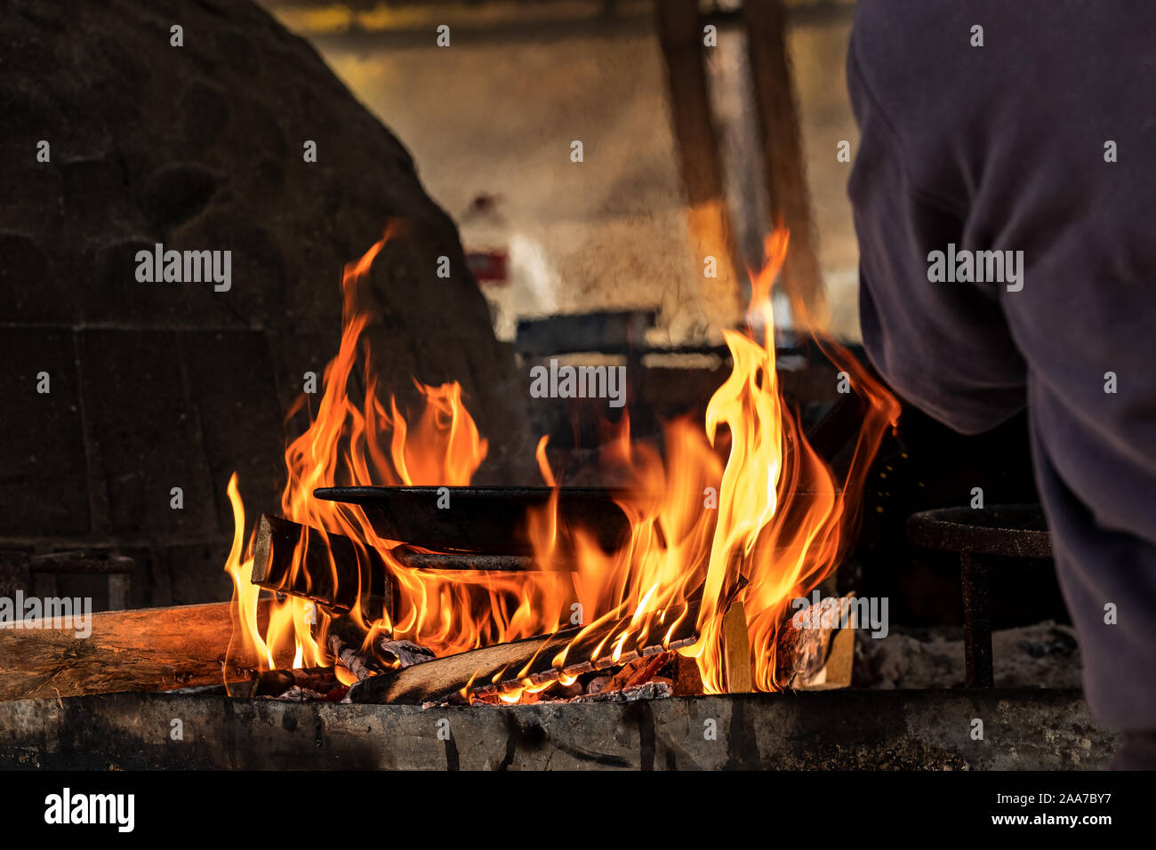 Preparing Traditional Spanish Food On An Open Fire Stock Photo