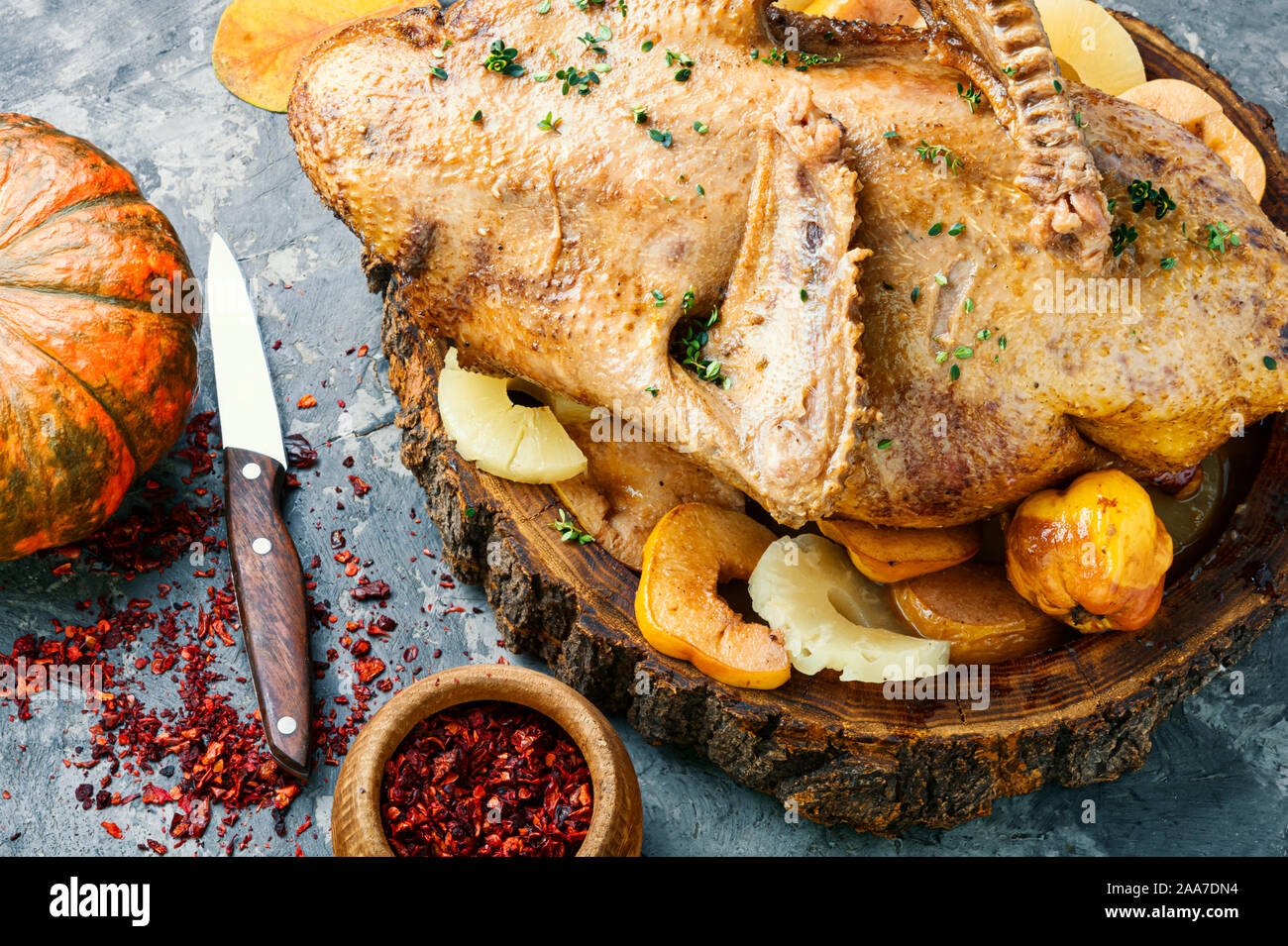 Baked whole duck with pineapple and quince Stock Photo - Alamy