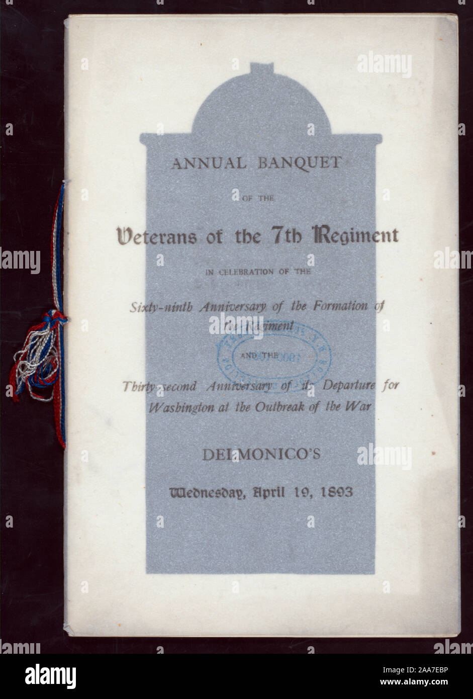 MARKER OF SITE OF ORGANIZATION OF THE 7TH REGIMENT REPRODUCED; MENU IN FRENCH; OUTER COVERS OF PARCHMNENT LIKE PAPER; FASTENED AT LEFT BY RED WHITE AND BLUE CORDS; CELEBRATION OF THE SIXTY-NINTH ANNIVERSARY OF THE FORMATION OF THE REGIMENT AND THE THIRTY -SECOND ANNIVERSARY OF ITS DEPARTURE FOR WASHINGTON AT THE OUTBREAK OF THE WAR [held by] VETERANS OF THE 7TH REGIMENT [at] DELMONICO'S, NEW YORK, NY (REST;) Stock Photo