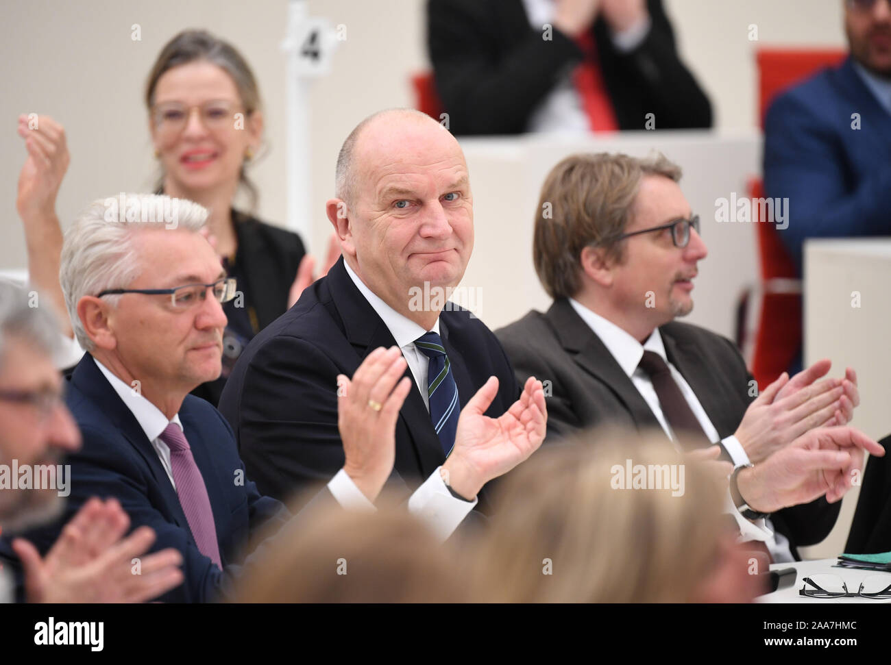 Potsdam, Germany. 20th Nov, 2019. Dietmar Woidke (M), acting prime minister and SPD chairman in Brandenburg, sits next to Mike Bischoff (l), outgoing SPD faction leader, and Björn Lüttmann (r), parliamentary SPD managing director during the state parliament session. Credit: Monika Skolimowska/dpa-Zentralbild/dpa/Alamy Live News Stock Photo
