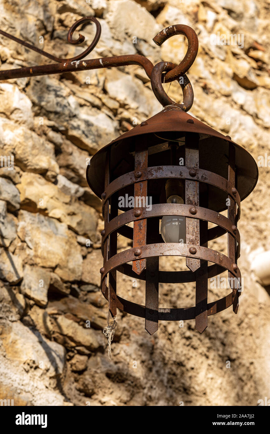 Street lamp in wrought iron. Medieval village of Canale di Tenno or Villa  Canale, Italian Alps, Trento province, Trentino-Alto Adige, Italy, Europe  Stock Photo - Alamy