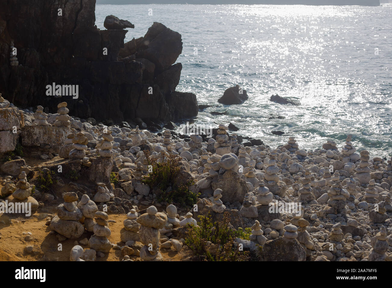 Beach with stacks of rocks called a cairns. Peniche Portugal Stock Photo Alamy