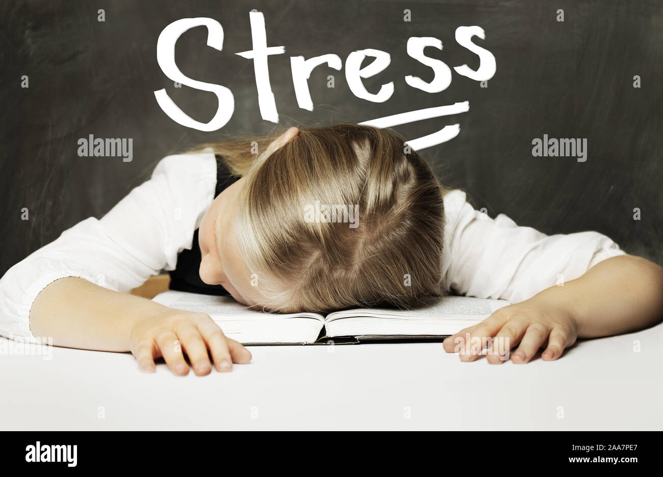 Sad Tired schoolgirl with books. Stress concept Stock Photo