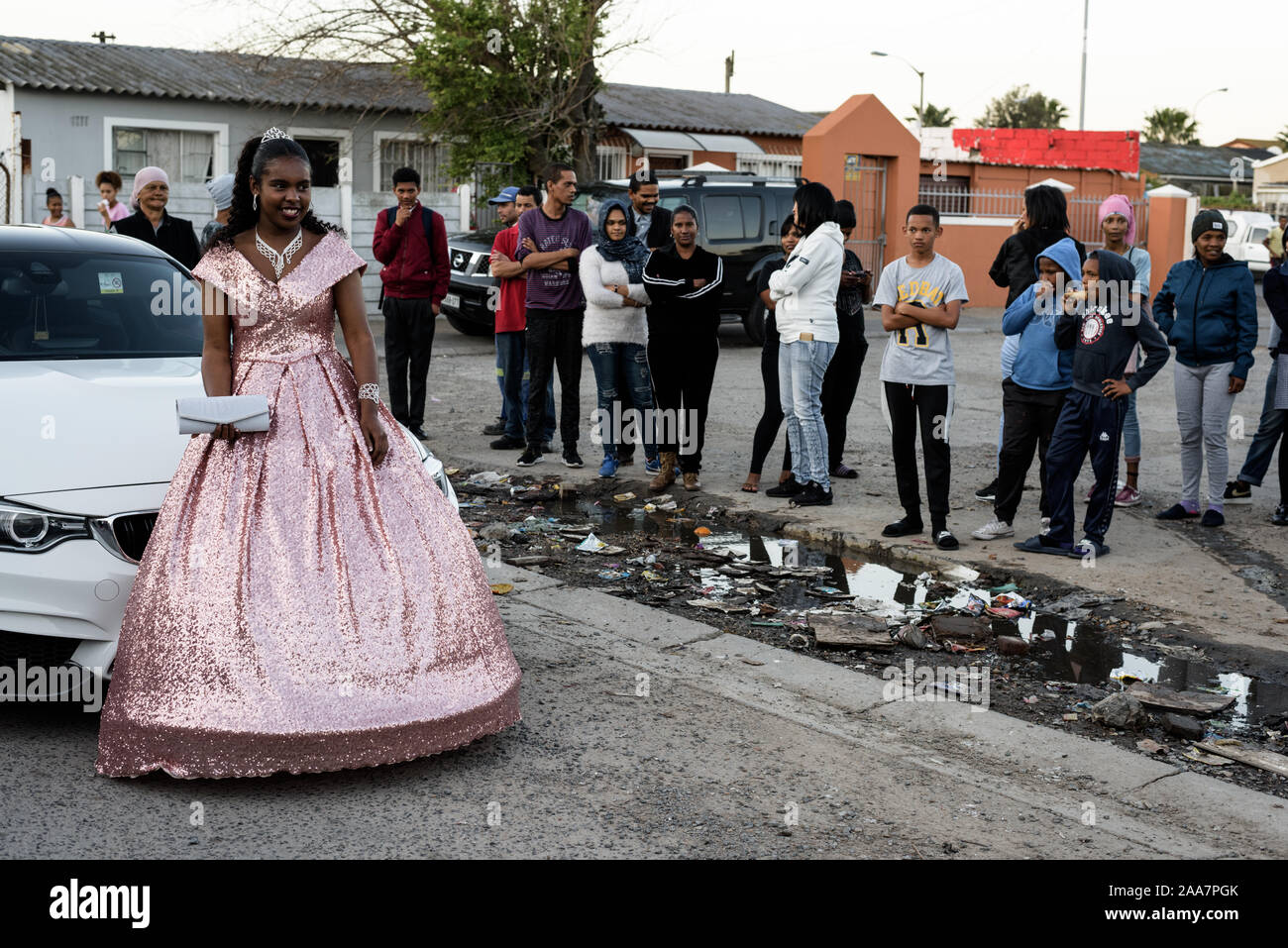 A young girl from Cape Town's gang infested Hanover Park departing for the Matric Dance, a South African tradition after graduating high school Stock Photo