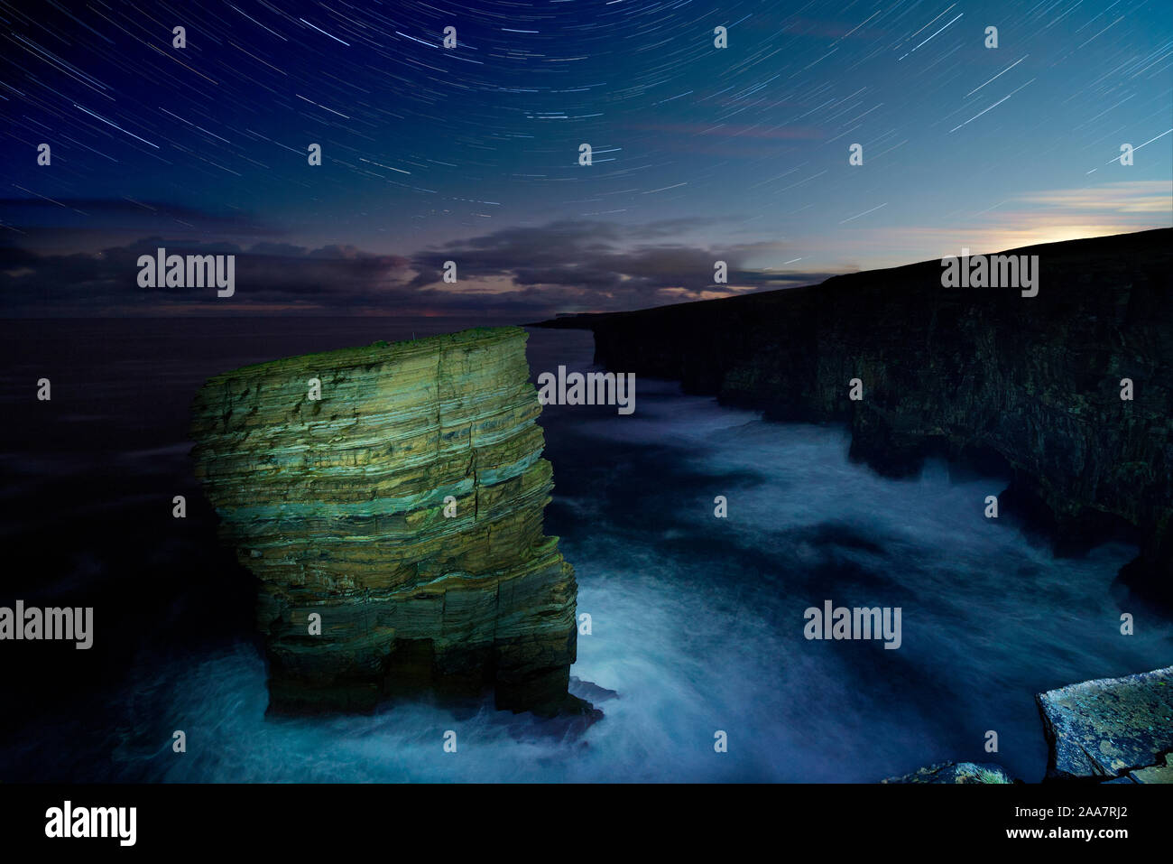 North Gaulton sea stack at night, Orkney Isles Stock Photo