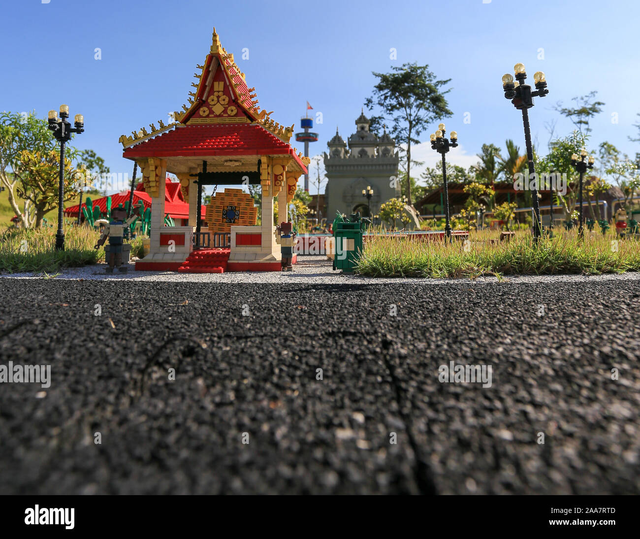 Miniature figurine and building made from brick block modeled after