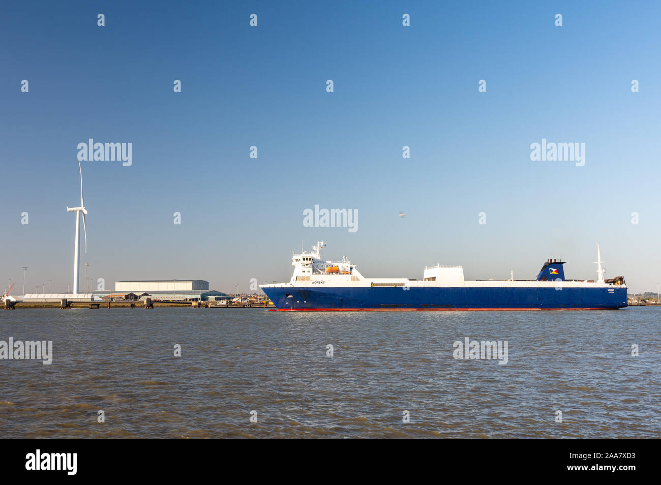 Gravesend, England, UK - September 21, 2010: A roll on-roll off cargo ferry sails on the Thames Estuary at Tilbury Docks in Essex. Stock Photo