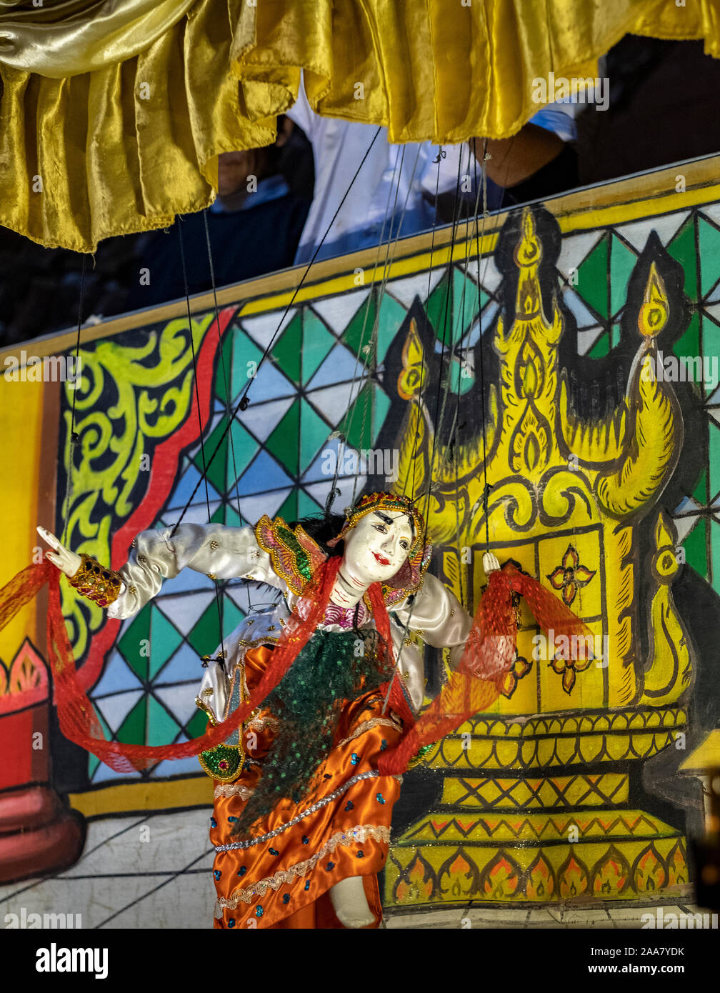 Colorful puppet theater with puppets representing Buddhist allegories and performed by experienced puppeteers behind a curtain in Bagan, Myanmar/Burma Stock Photo