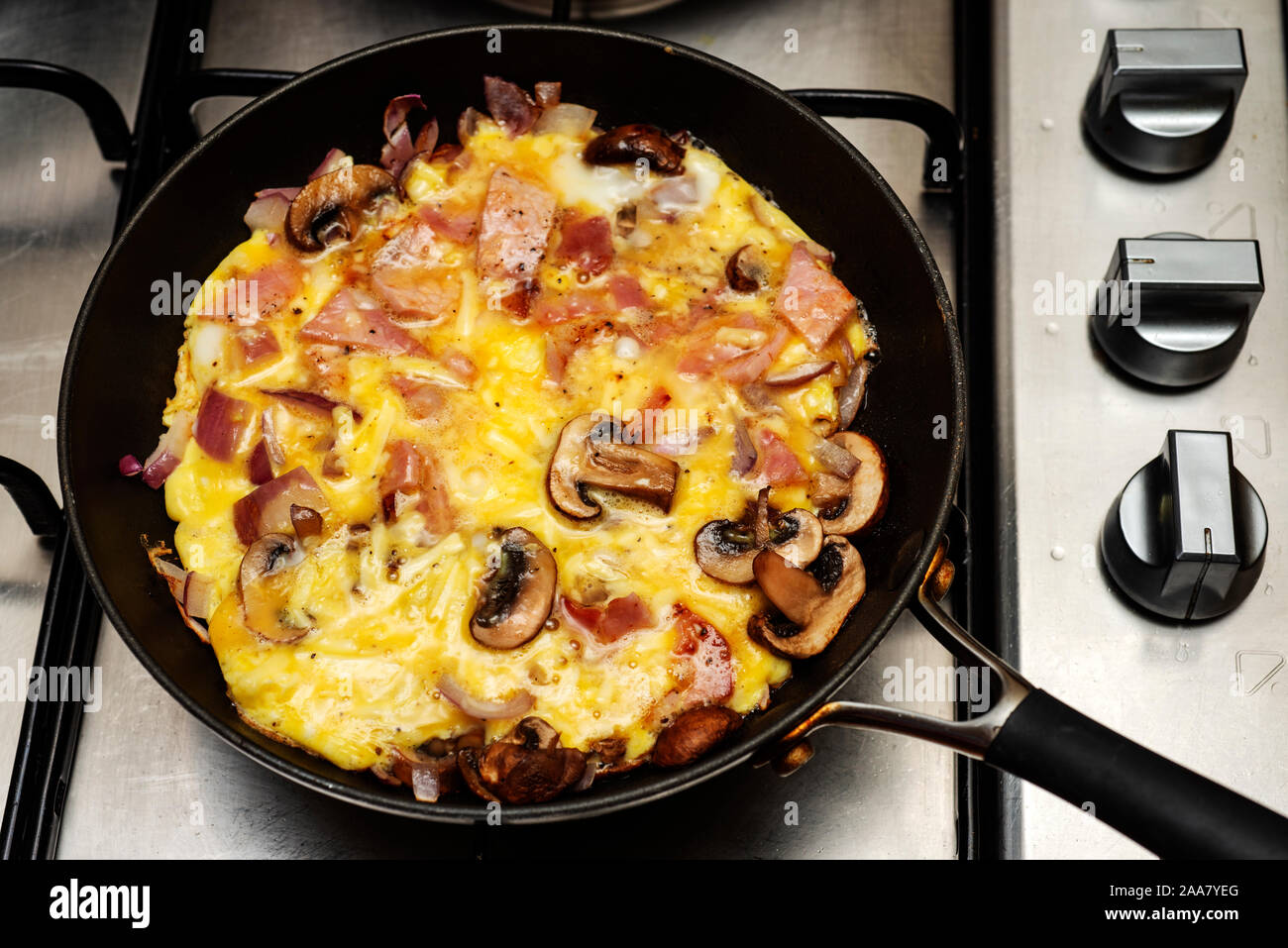 Mushroom bacon and cheese omelette Stock Photo Alamy