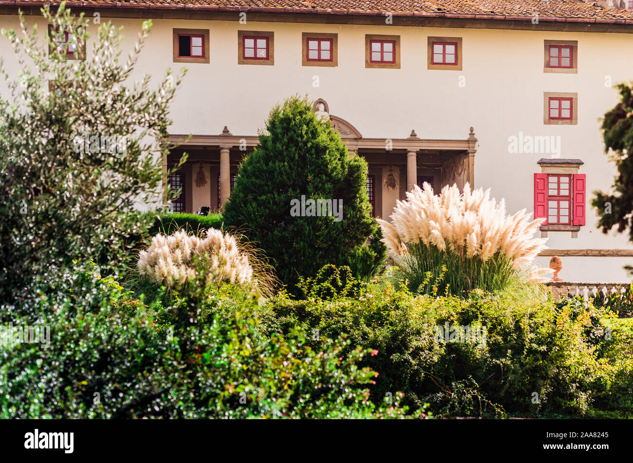Artimino, Tuscany, Italy, beautiful medici villa La Ferdinanda or Cento Camini front facade detail in its elegant evergreen garden Stock Photo