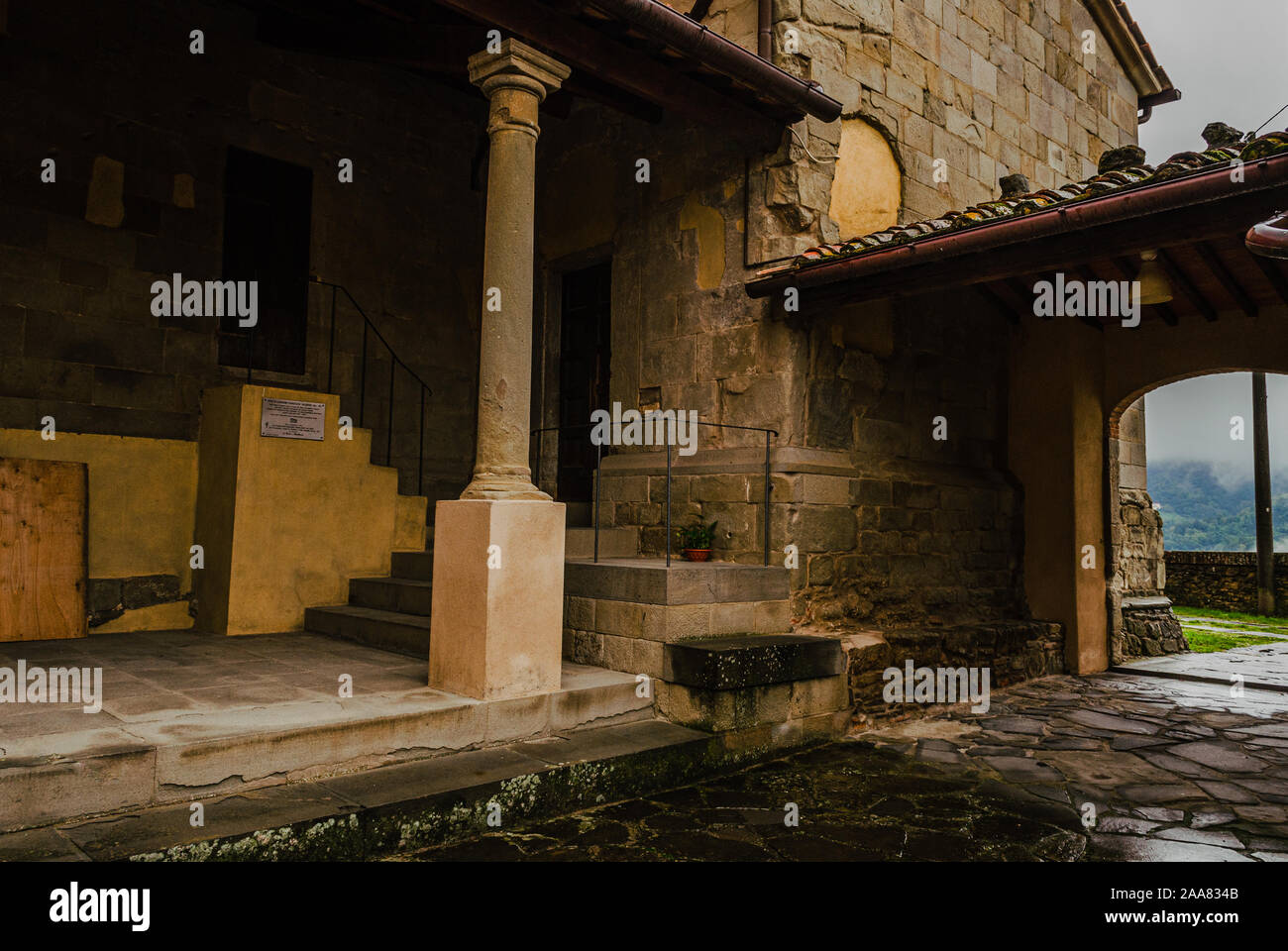Valdibure small old parish church typical courtyard, stone building