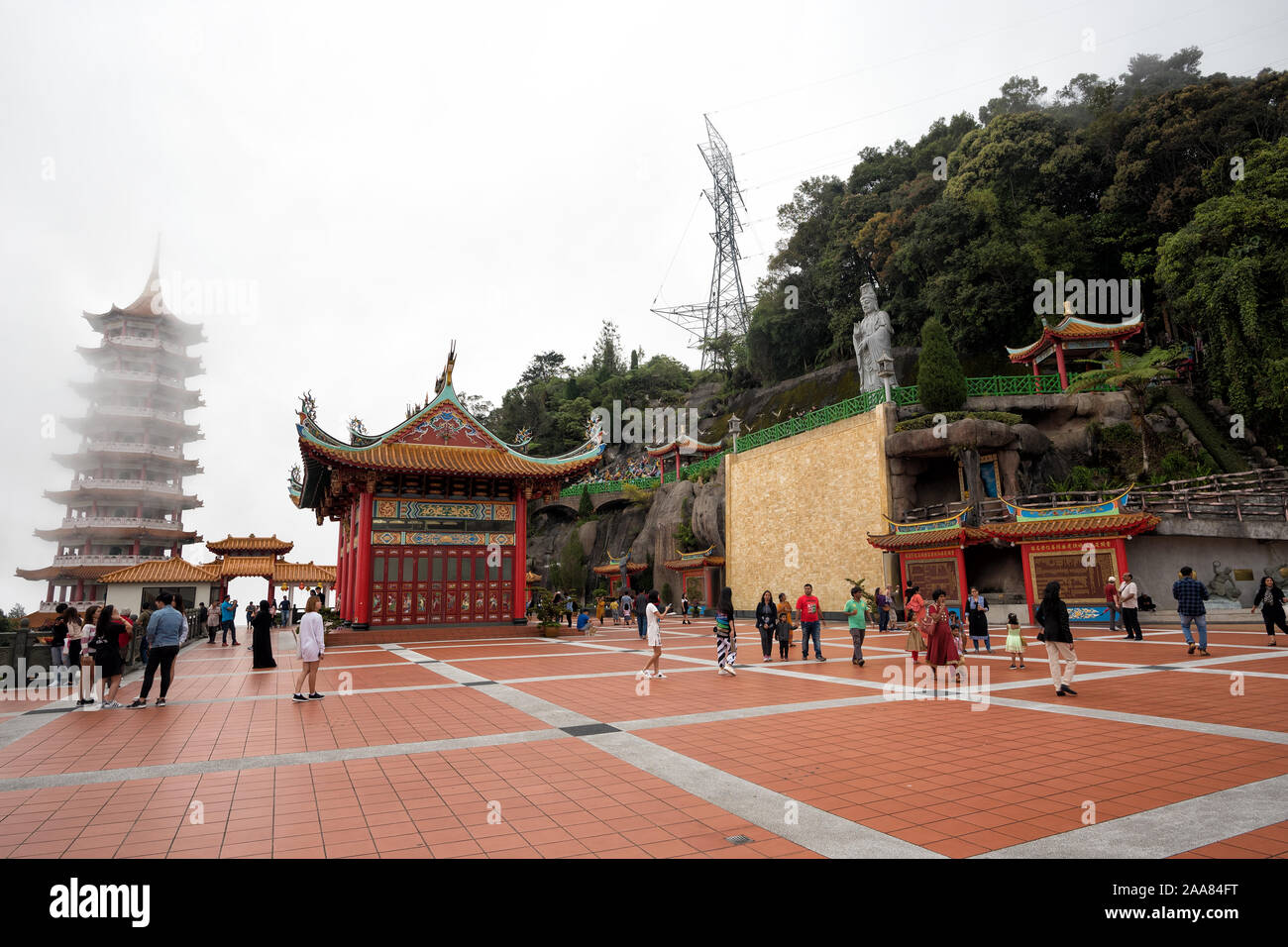 Genting Highland, Malaysia - Nov 20, 2018: Unidentified tourists visiting the scenic site of foggy Chin Swee Temple, Genting Highland, Malaysia - The Stock Photo