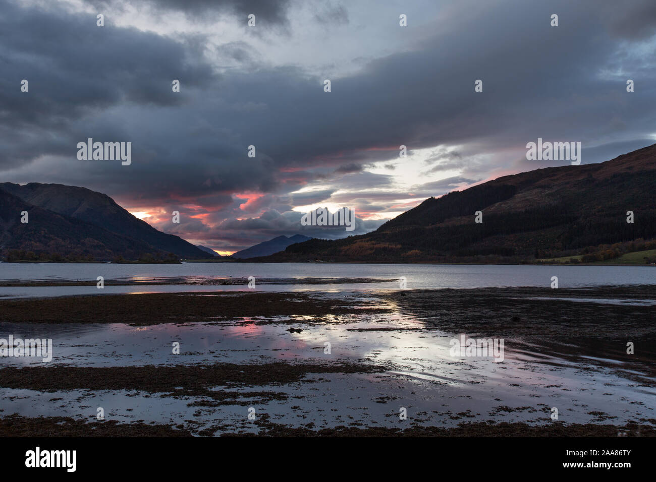 Area of Glencoe, Scotland. Picturesque dusk view of Loch Leven with North Ballachulish in the distant background. Stock Photo