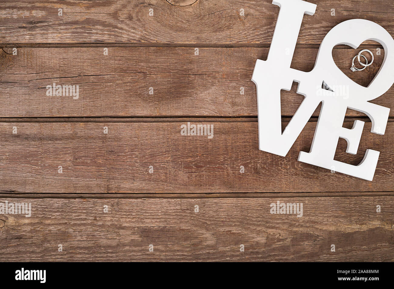 ring on wooden table. Still life top view Stock Photo Alamy