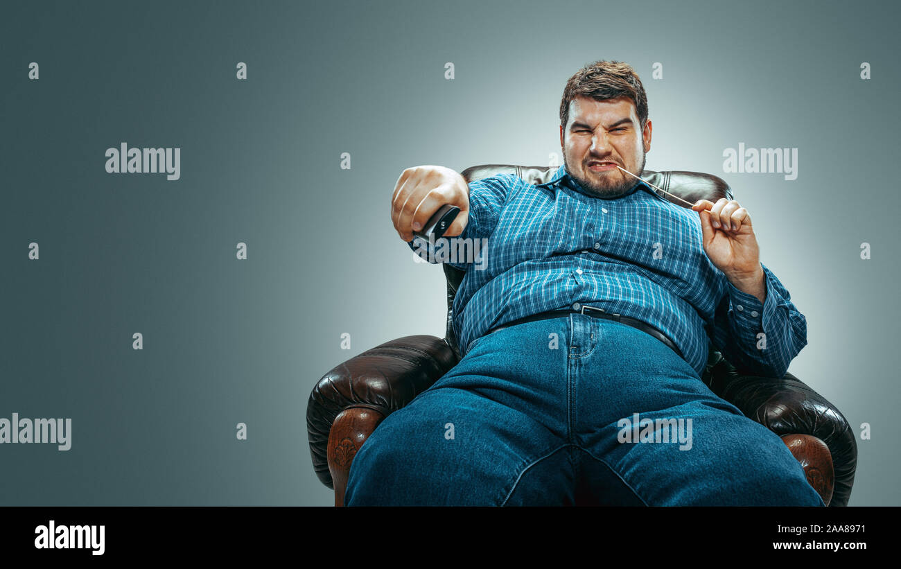 Fat Man On Chair High Resolution Stock Photography and Images Alamy