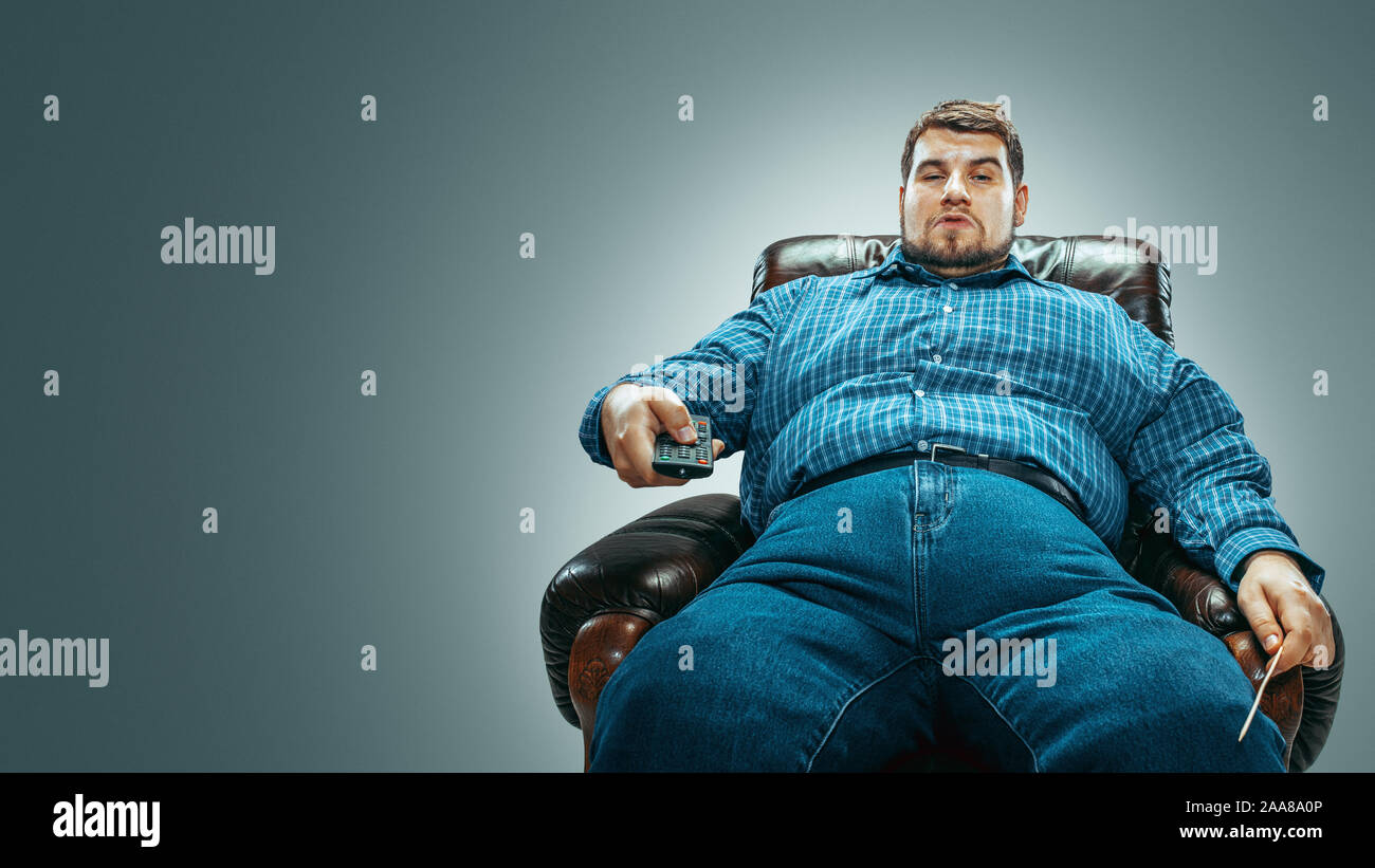 Fat Man On Chair High Resolution Stock Photography and Images Alamy