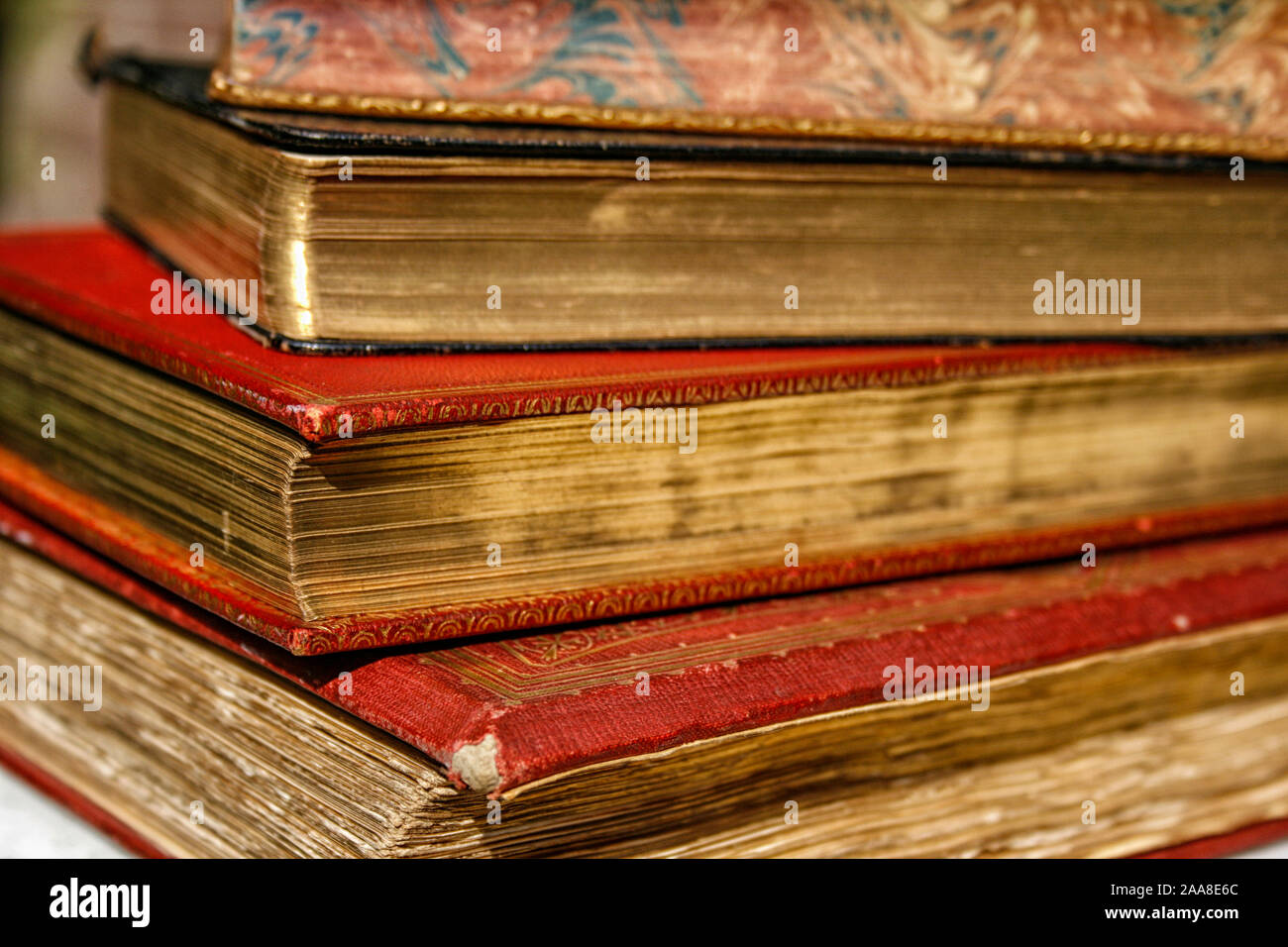 vintage books with special golden coating on pages Stock Photo