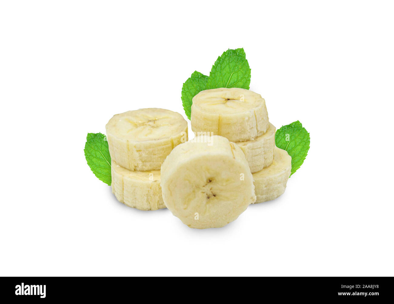 banana slices with mint leaves on a white background. toning. selective focus Stock Photo