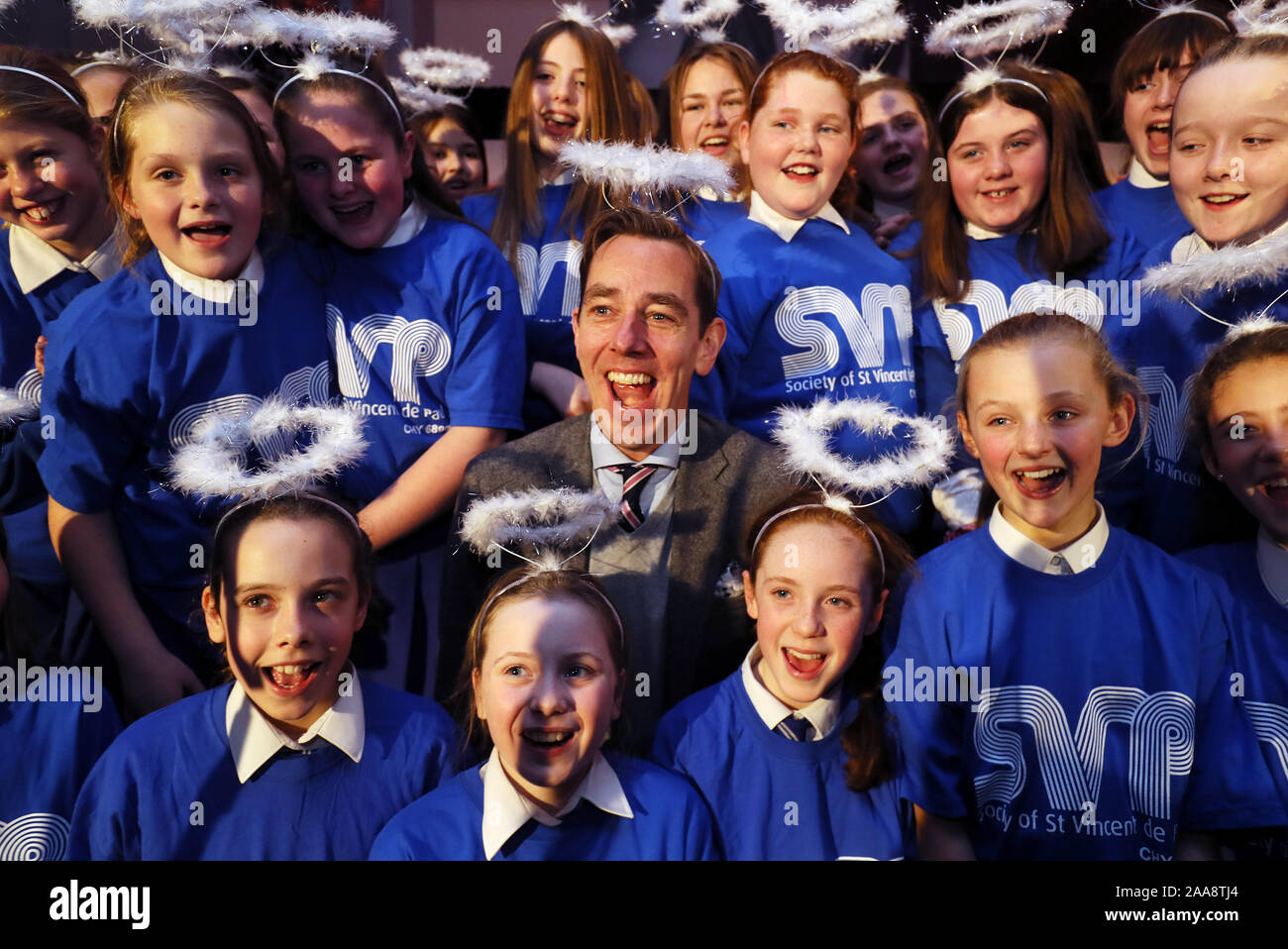 RTE presenter Ryan Tubridy with members of the St. Joseph's primary school, Tipperary, choir at the launch of the St. Vincent de Paul annual appeal at their headquarters in Dublin. SVP has again put children at the heart of its Annual Appeal saying that this is because they are the most vulnerable. Stock Photo