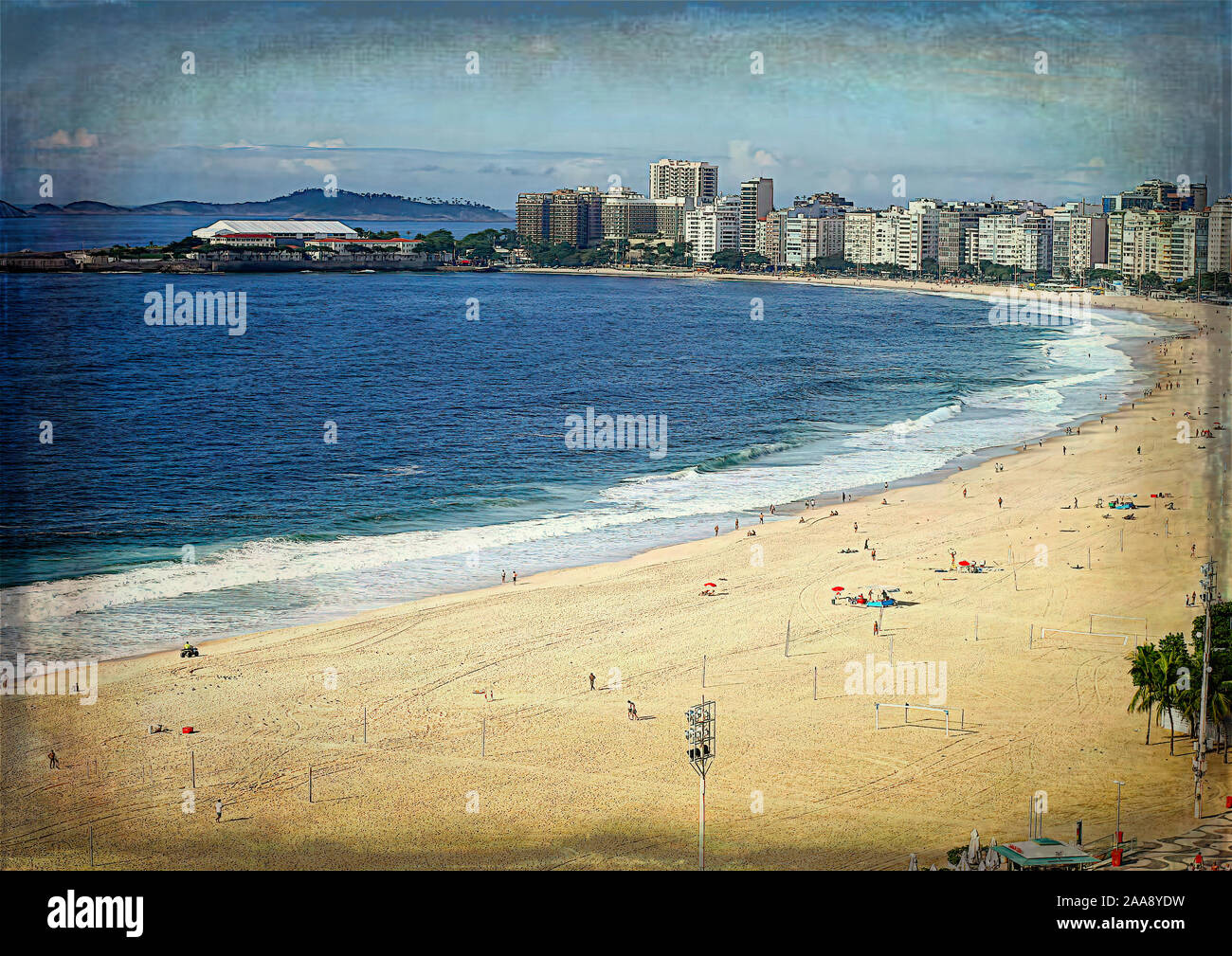 Huge yellow sandy Copacabana beach on the shore of the blue ocean in ...