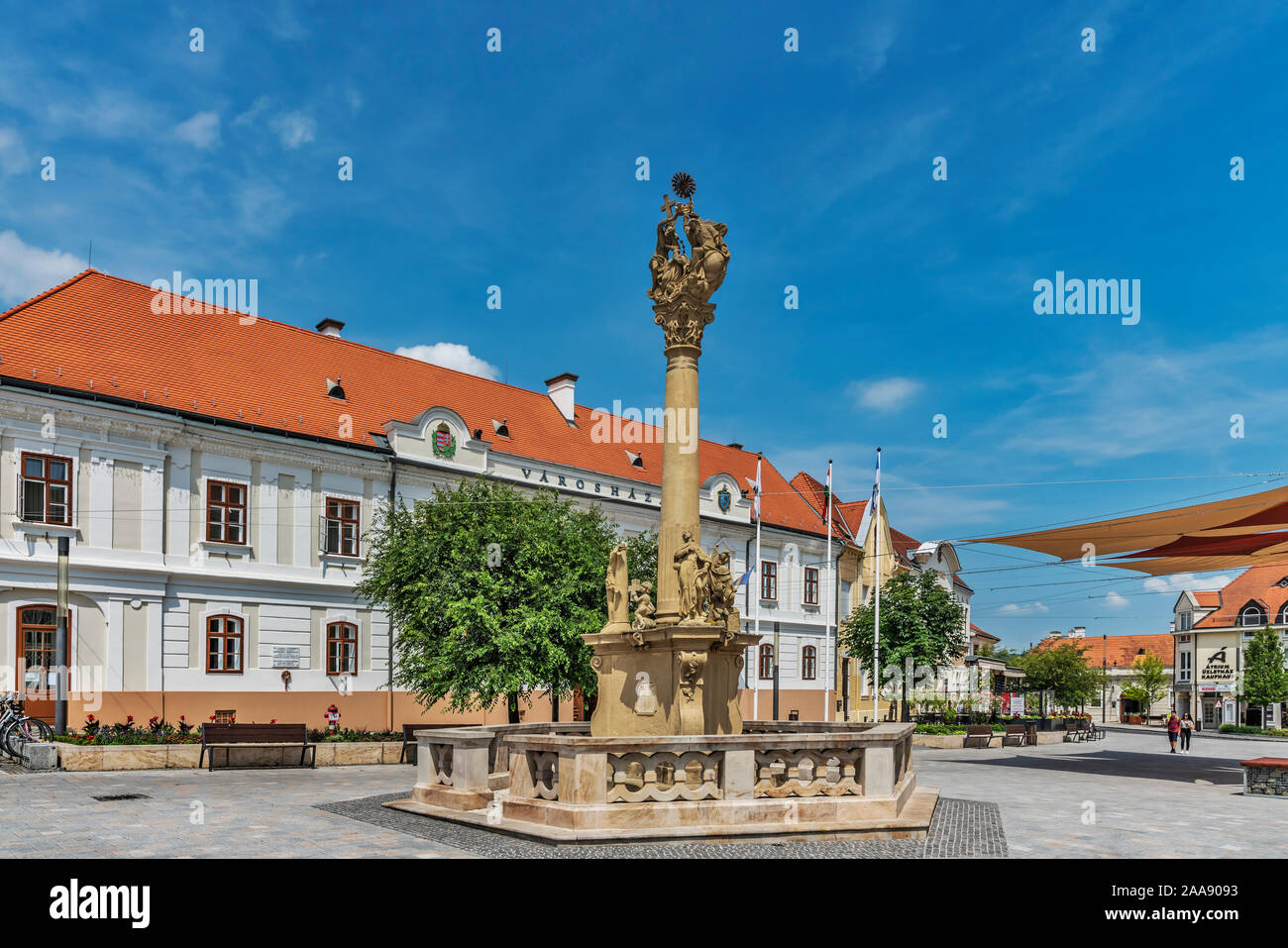Trinity Column in Baroque style was built in 1770. It is located in the main square Fo Ter in Keszthely, Zala county, Western Transdanubia, Hungary Stock Photo