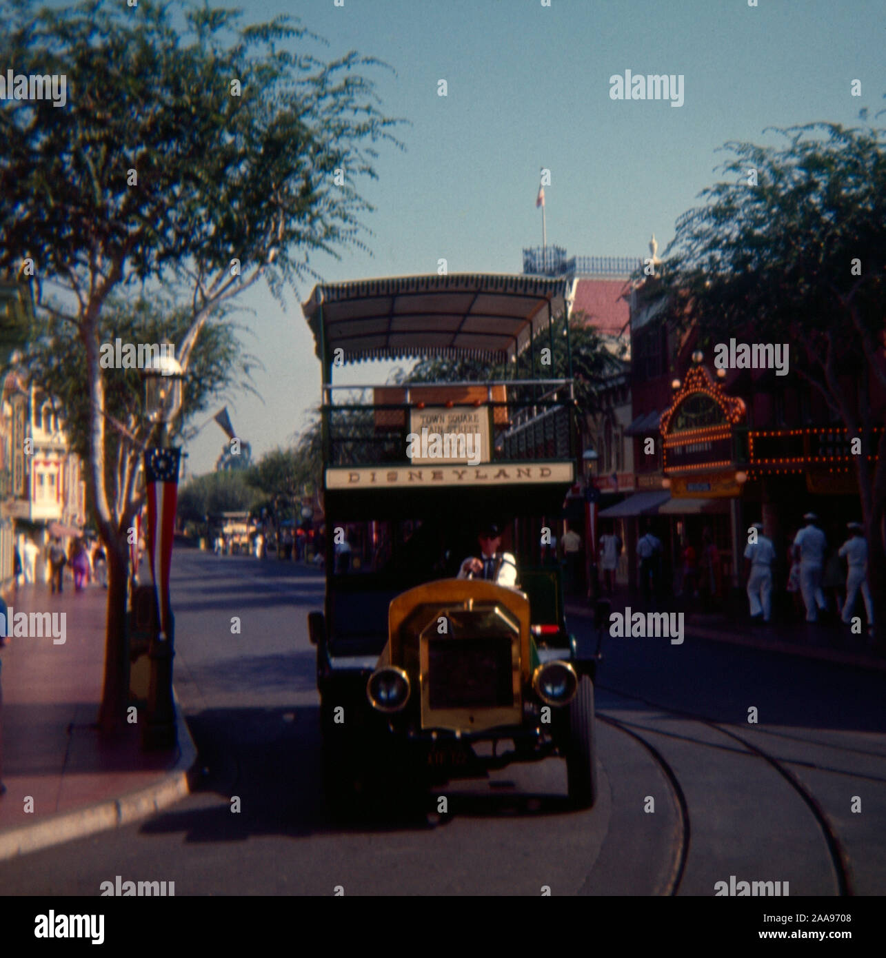 Vintage September 1972 photograph, Disney Transportation Co. bus on Main Street at Disneyland theme park in Anaheim, California. SOURCE: ORIGINAL 35mm TRANSPARENCY Stock Photo