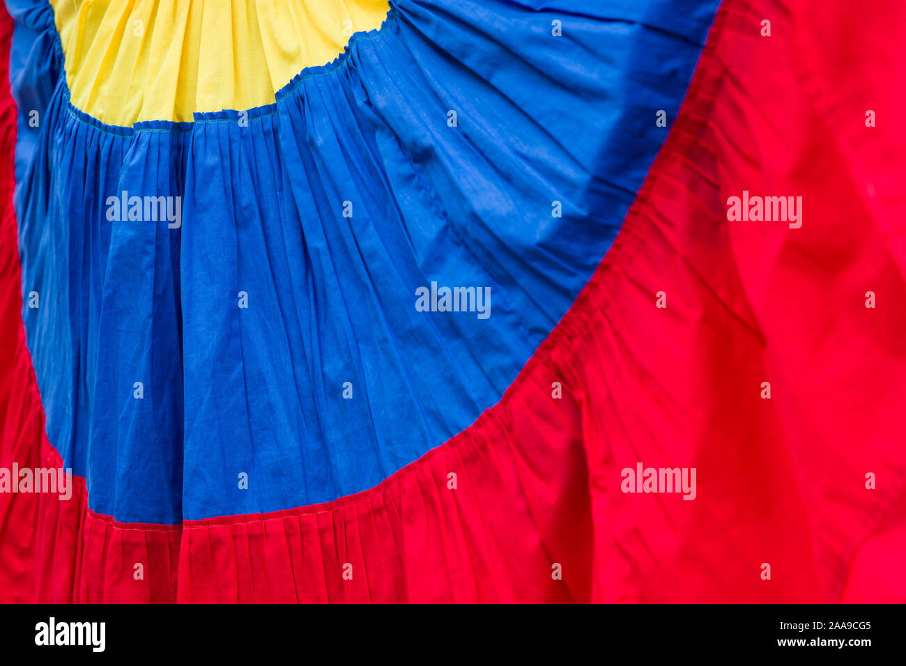 Closeup detail of Palenquera, fruit seller, dress in the colors of Colombian flag Stock Photo
