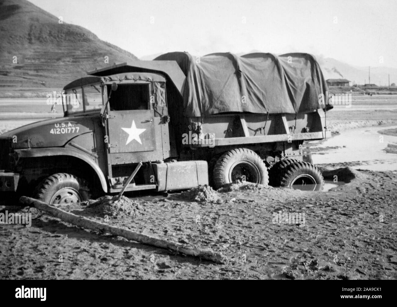 US Army truck stuck in the mud in Korean War, ca. 1953. Stock Photo