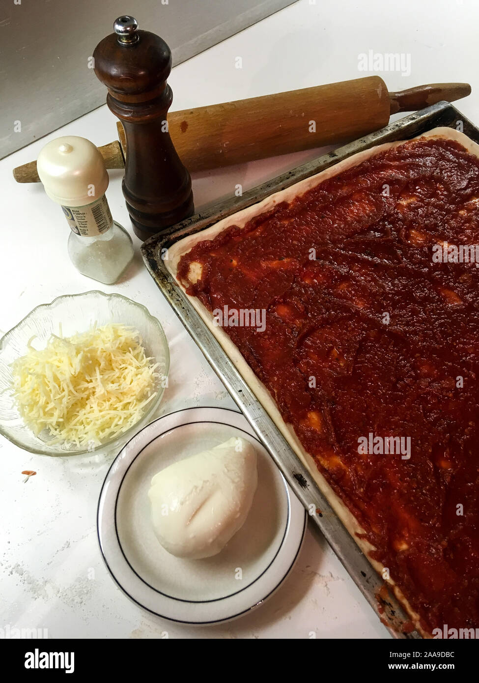 Preparing a pizza, Lyon, France Stock Photo Alamy
