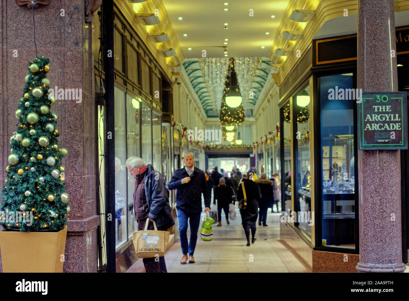 Glasgow, Scotland, UK 20th November, 2019. Glasgow Loves Christmas with  Christmas lights, fairs and decor appear on the streets as shopping takes to the festival in a decorative way i the cictorian Argyle Arcade  in the heart of the town. Gerard Ferry/ Alamy Live News Stock Photo